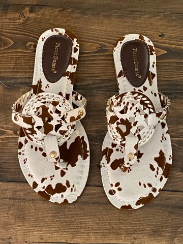 COURTNEY COW PRINT FLIP FLOPS